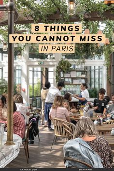 people sitting at tables in a restaurant with the words 8 things you cannot miss in paris