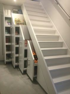 the stairs are built into the wall to allow storage