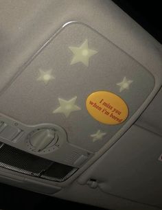 the inside of a car with stars on it and a sign that says, trust for what i'm doing