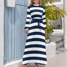 Elevate your style with our Navy and White Stripe Dress. Featuring long sleeves and a high neck, this casual long dress offers a classic stripe pattern, perfect for any occasion. Made from comfortable fabric, it's ideal for versatile fashion and seasonal transitions. Custom Women's Long Sleeves High Neck Dress Casual Long Skirts * [Material]: Polyester 95%+spandex 5% * [Type]: Dress * [Occasion]: A slip dress is a versatile piece of clothing that can be worn for a variety of occasions, like daily wear, shopping, weekend, vacation, cruises, honeymoons, going out, clubs, parties, beaches, evenings, and other occasions. * [Care Instruction]: Hand wash or machine wash. About this Item * Breathable fabrics The main material of these dresses is polyester fabric, which is super breathable and kee High Neck Dress Casual, Casual Long Skirts, Long Sleeve High Neck Dress, Dress Casual Long, Casual Long Dress, Long Skirt Casual, Dress Modest, Dress Occasion, Long Dress Casual