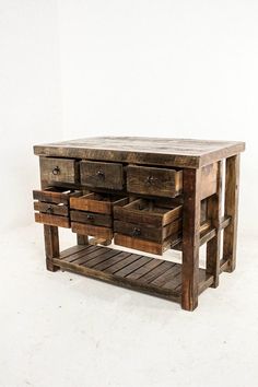 an old wooden table with drawers and shelves on one side, against a white background