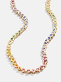 Our Kali collection just got another style that's sure to become one of your everyday favorites. The Kali Necklace features an eternity necklace band fitted with an ombre of heart-shaped rainbow crystals. It's the perfect pop of color to add to your collection. Ups Shipping, 18k Gold Necklace, Heart Shaped Jewelry, Rainbow Jewelry, Rainbow Beads, Rainbow Crystal, Jewelry Lookbook, Beaded Stretch Bracelet, Heart Beads