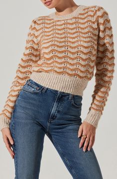 Wavy stripes are stitched into this fuzzy alpaca-kissed sweater framed by solid ribbing for an ultracomfy touch. Crewneck Long sleeves Ribbed cuffs and hem 55% acrylic, 40% nylon, 5% alpaca Dry clean Imported Stitch Sweater, Astr The Label, The Label, Alpaca, Sweater Top, Mustard, Top Brands, Dry Clean, Nordstrom