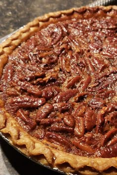 a pecan pie sitting on top of a table