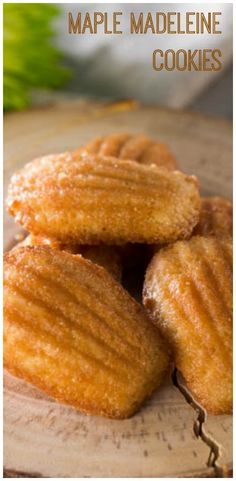 maple madeline cookies are stacked on top of each other with leaves in the background