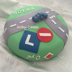 a birthday cake that is shaped like a road