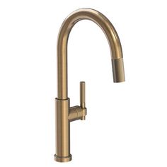 a brass colored faucet with two handles and nozzles on the side