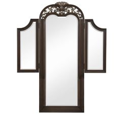 a large mirror with an ornate design on the top and bottom panel, in dark wood