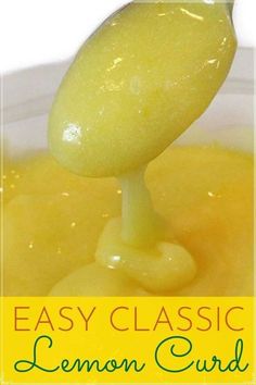 a spoon full of lemon curd sitting on top of a white bowl with the words, easy classic lemon curd