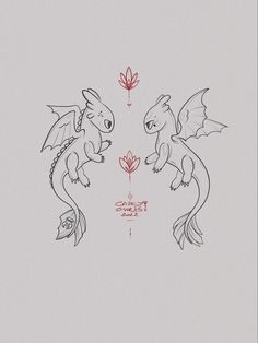 two dragon are facing each other with red ink on white paper in front of them