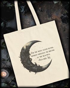 Annabel Lee Tote Bag featuring a quote from Edgar Allan Poe's poem, "Annabel Lee"..... For the moon never beams, without bringing me dreams of the beautiful Annabel Lee." 

#canvasbag #darkacademia #poequotes #literaryquotes #lovepoem Pumpkin Games, Gothic Artwork, Annabel Lee, October Fashion, Black Pumpkin, Horror Book, Edgar Allan, Edgar Allan Poe, Literary Quotes