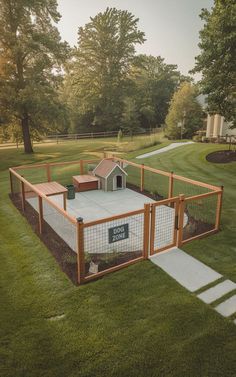 a dog house with a fence around it