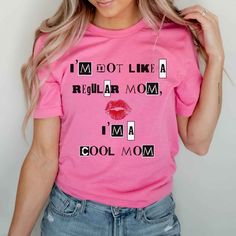 -100% Airlume combed and ringspun cotton (fiber content may vary for different colors) -Light fabric (4.2 oz/yd) -Tear away label -Runs true to size Cotton Slogan T-shirt As Gift, Cool Letter Print T-shirt For Spring, Pink Graphic Print T-shirt For Mother's Day, Pink T-shirt With Letter Print For Everyday, Cotton T-shirt With Letter Print For Mother's Day, Funny Pink T-shirt For Spring, Pink T-shirt With Funny Print For Everyday Wear, Trendy Tops With Funny Text For Mother's Day, Pink Cotton T-shirt With Funny Print