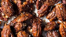 there are many pieces of pecans that have been seasoned with salt and pepper on top