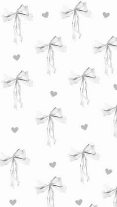 a white background with hearts and ribbon on the end of each string, as if tied together