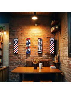 a brick wall in a restaurant with wooden tables and chairs