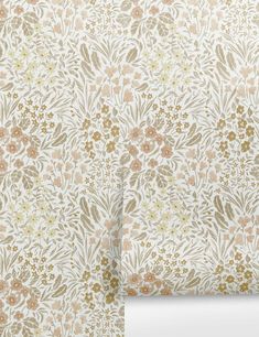 two wallpapers with flowers and leaves on them, one in gold and the other in white