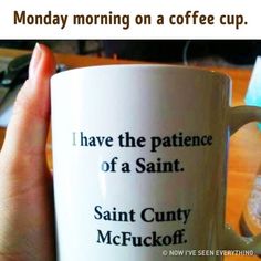 a person holding a coffee mug with the words i have the patience of a saint