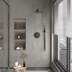 a bathroom with gray walls and white tile flooring is shown in this image, there are shelves on either side of the shower