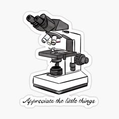 a microscope with the words appreciate the little things sticker on it's side