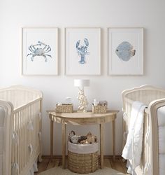 a baby's room with two cribs and pictures on the wall