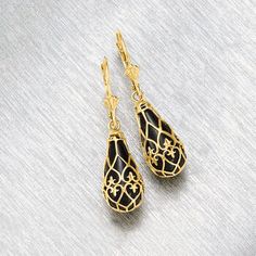 Ross-Simons - Black Onyx Teardrop Earrings in 14kt Yellow Gold. Brimming with sophisticated drama, our teardrop earrings feature 16x8mm black onyx teardrops wrapped in polished 14kt yellow gold openwork. Hanging length is 1 3/8". Leverback, black onyx drop earrings. Jewelry Presentation, Yellow Gold Jewelry, Teardrop Earrings, Free Jewelry, Black Onyx, Onyx, Gold Jewelry, Jewelry Collection, Fine Jewelry