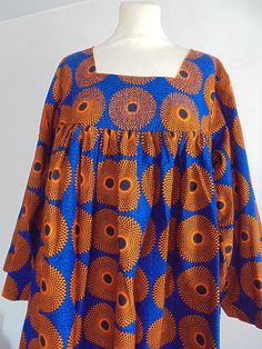 Beautiful days are coming... A beautiful KABA-inspired long dress, sewn in a classic wax fabric. This dress hides small curves and makes you feel comfortable. Very nice finishes. Perfect going out outfit. Evening dress It has a nice cutout front and back. Total length 119 cm chest 120 cm sleeve 65 cm Size 44 to 48 Cameroonian Kaba Styles, Beautiful Days, Wax Fabric, African Traditional Dresses, Africa Fashion, Stylish Work Outfits, African Design Dresses, Latest African Fashion Dresses, African Wear