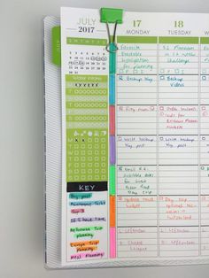 a planner is hanging on the wall