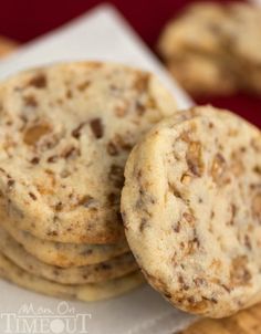 a stack of cookies sitting on top of a white plate