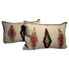 two decorative pillows on white background