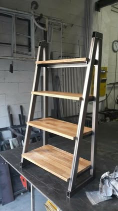 a metal and wood shelf in a garage