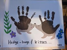 two handprints with the words hedge - hugs and kisses