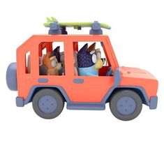 an orange toy car with stuffed animals in it