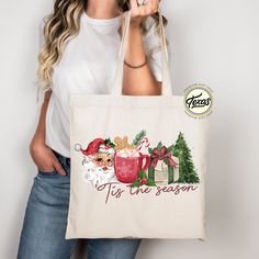 a woman holding a christmas shopping bag