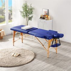 The folding facial beauty bed is made of beech wood with soft cushion and supported by composite boards and aluminium alloy frames. Also, the installation of the massage table is toolless, and all you need to do is to open the case and let bed legs out to the place. This folding massage couch can be used for multiple purposes, home massage, spa, beauty salon, clinic, etc. Enjoy your comfortable massage in this adjustable and portable massage bed Specifications: Materials: Beech Wood Leg + Compos Home Massage Room, Spa Portable, Home Gym Inspiration, Home Massage, Calm Yourself, Reiki Room, School Tables, Portable Spa, Adjustable Bed Base