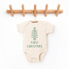 The perfect bodysuit for your perfect baby! These short sleeve bodysuits have 3 snap closure and double needle ribbed binding on neck, shoulders, sleeves, and leg openings. Machine wash cold, inside out. Air dry or tumble dry low. Cute Christmas Holiday Onesie, White Cotton Onesie For Holidays, Holiday White Cotton Onesie, Cute Christmas Onesie, Cute Cotton Christmas Onesie, Cute Christmas Cotton Onesie, Cute Cotton Onesie For Holidays, Personalized Baby Onesies, Kids Onesies