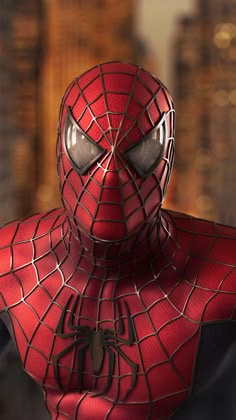 a close up of a spider man in front of a cityscape at night