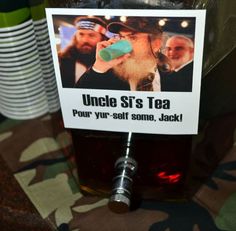 a jar filled with tea sitting on top of a table