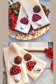 two knitted towels sitting on top of a table next to berries and an open book