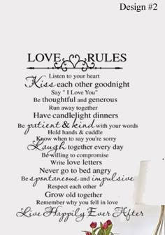 a wall decal with the words love rules written on it