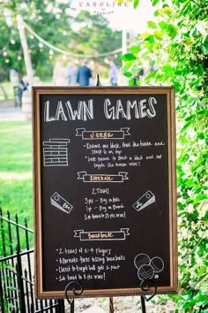 the lawn games sign is on display outside