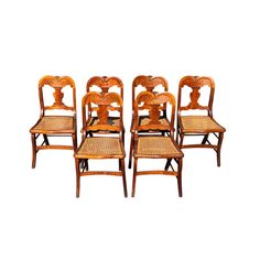 set of six chairs with cane back and wicker seats