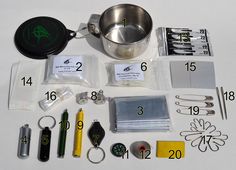 the contents of a camping kit laid out on top of a white table with numbers