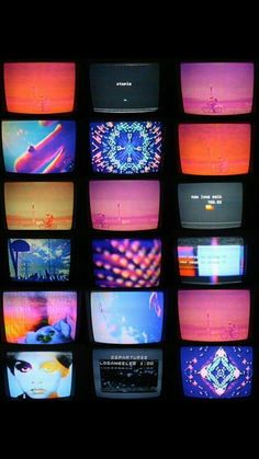 many televisions with different colored images on them