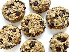 chocolate chip oatmeal cookies arranged on a white surface with one cookie in the middle