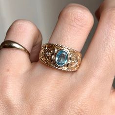 Gold Oval Blue Topaz Birthstone Ring, Gold Heirloom Style Blue Topaz Birthstone Ring, Heirloom Gold Blue Topaz Birthstone Ring, Heirloom Gold Birthstone Ring With Blue Topaz, Heirloom Gold Ring With Blue Topaz, Heirloom Gold Topaz Ring With Blue Topaz, Heirloom Gold Blue Topaz Ring, Heirloom Oval Topaz Ring, Heirloom Blue Topaz Oval Ring