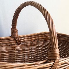 a wicker basket sitting on top of a table