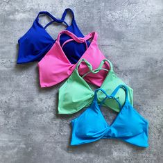 Green Sleeveless Sports Bra With Built-in Bra, Workout Top With Built-in Bra, Triangle Shape, Sports Crop Top With Built-in Bra And High Stretch, T-back Sports Bra With Medium Bust Support For Yoga, Sporty Sports Bra With Built-in Padding For Summer, Gym Sports Bra With Built-in Bra And Wide Straps, Sports Swimwear With Built-in Bra And Stretch, Sports Swimwear With Built-in Bra And Wide Straps, Nylon Sports Bra With Built-in Bra For Gym