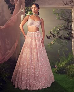 Featuring an orchid pink organza lehenga with white thread work. It is embellished with sequence and bugle beads.From Aneesh Agarwaal's Ellora collection.DELIVERY TIMEPlease allow 8-12 weeks for your outfit to arrive.FABRIC DETAILSOrganzaProfessional cleaning only. Pink Organza Lehenga, Tulle Lehenga, Organza Lehenga, Padded Blouse, Pink Lehenga, Beaded Neckline, Indian Wedding Outfits, Lehenga Designs