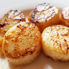 some kind of food that is on a white plate